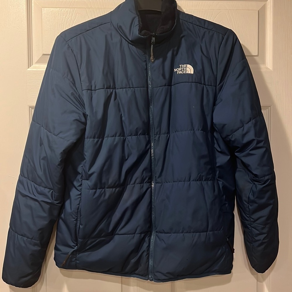 Men’s reverse able North Face jacket in a size large